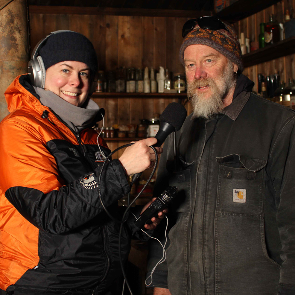 Trust Executive Director Francesca Eathorne records an interview with Al Fastier inside Scott’s Terra Nova hut, Cape Evans. © AHT/Nicola Stewart